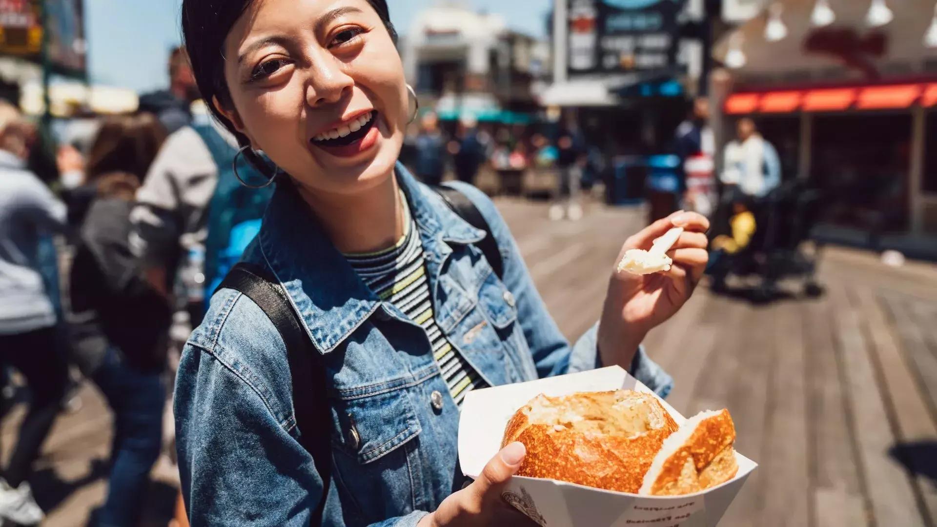 Woman with chowder at PIER 39