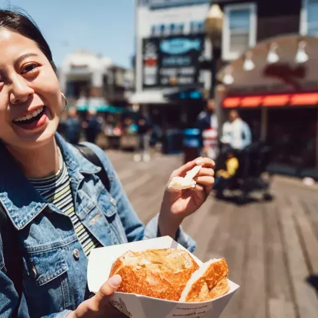 Woman with chowder at PIER 39