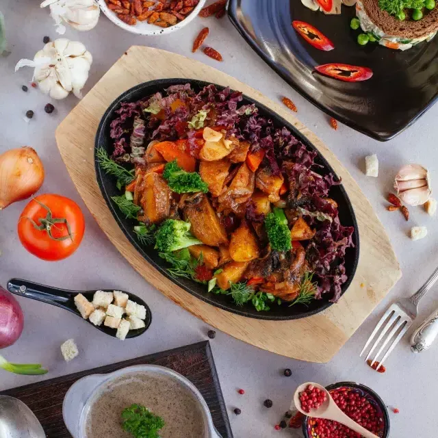 A table full of delicious vegetarian and vegan dishes.